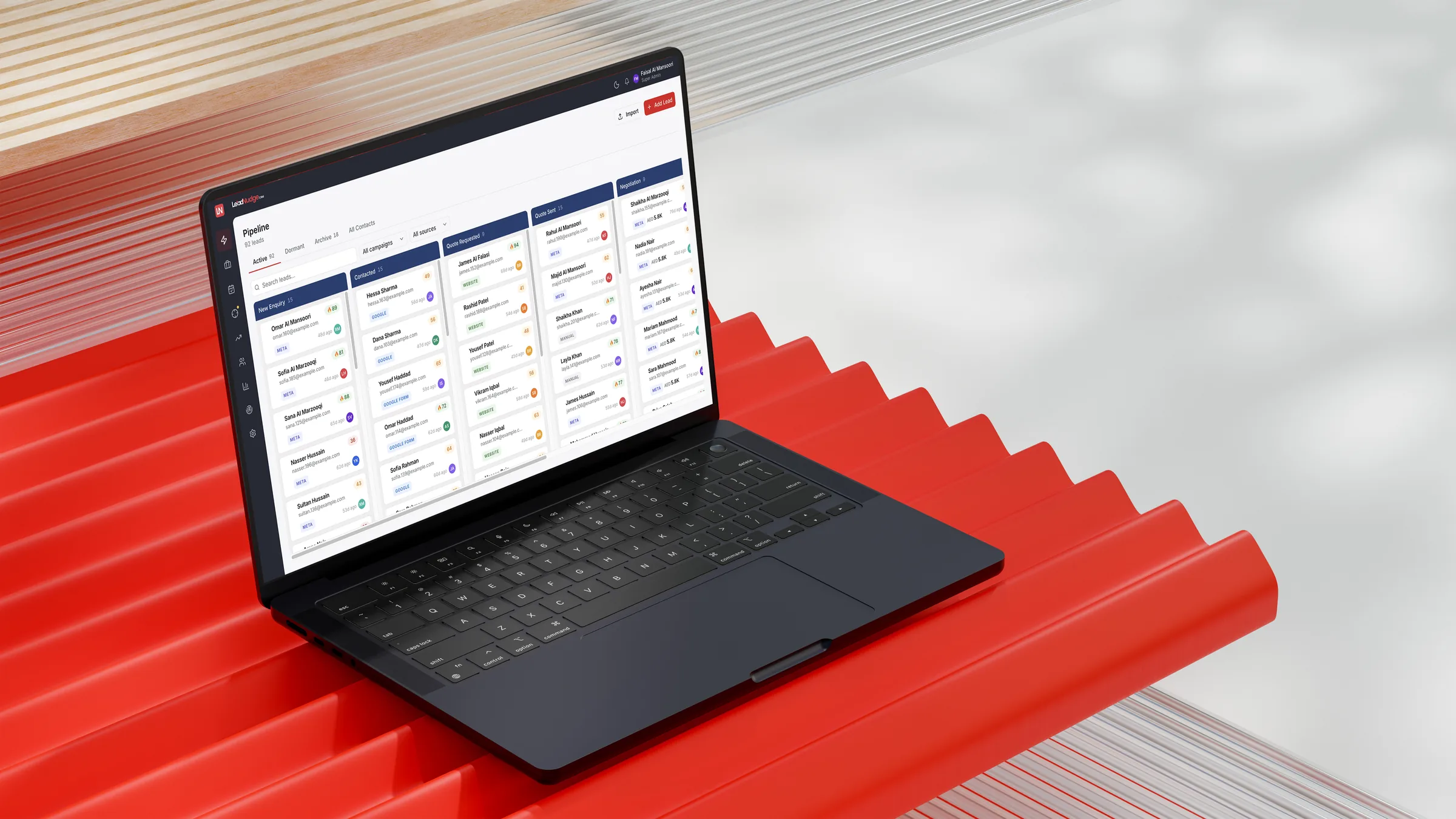 LeadNudge CRM pipeline board open on a laptop: leads from Meta, Google and the website sorted by stage, each with a lead score
